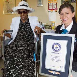 Susannah Mushatt Jones and a Guinness Book of World Records representativeGuinness Book of World Records
